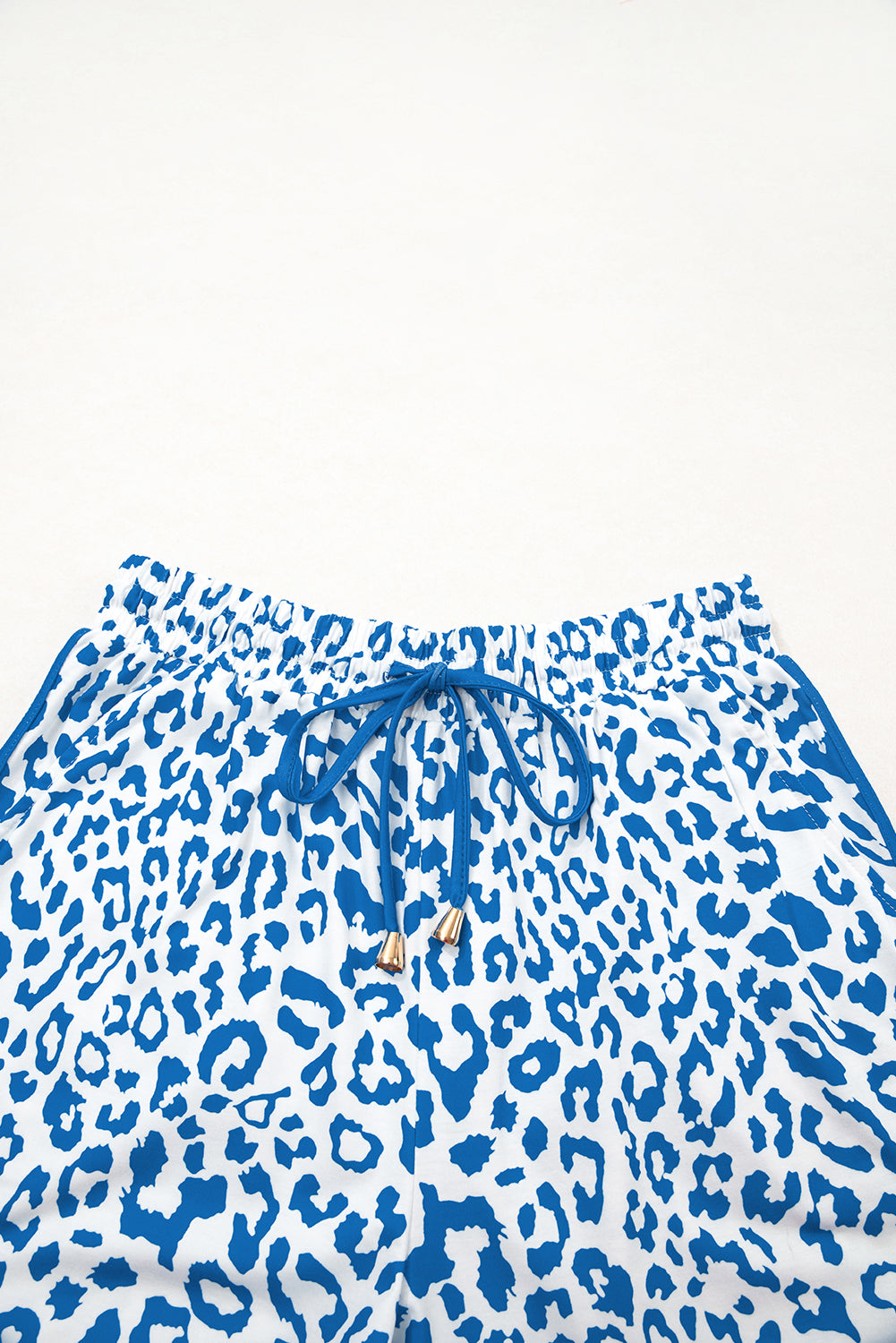Pink leopard print casual shorts with elastic waist, lace-up front, contrast trim, made by Mommas Hive.