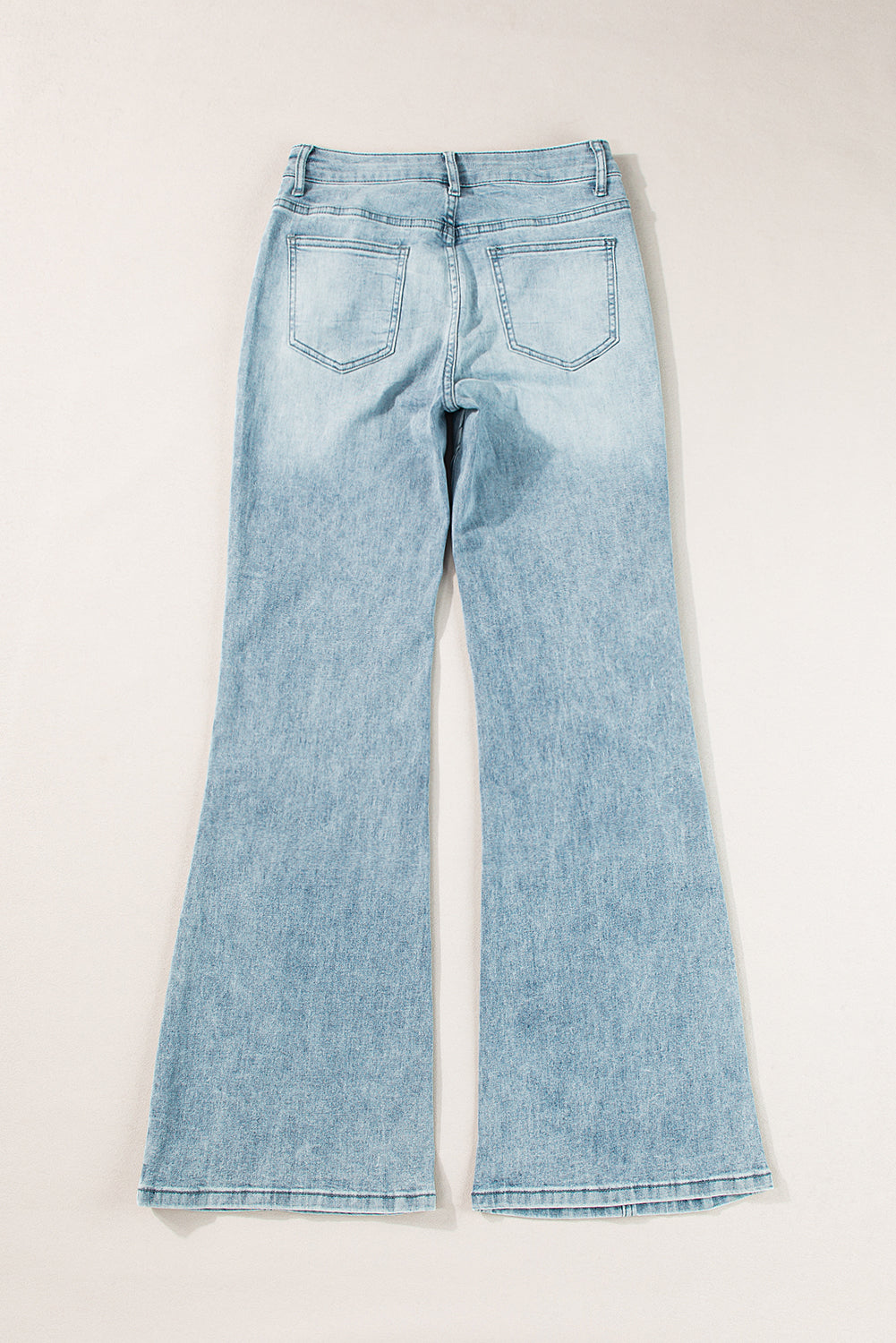 Dusk blue acid wash Mommas Hive wide-leg high waist long jeans with 6.75 oz cotton, polyester, and elastane fabric.