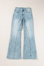 Dusk blue acid wash wide-leg high waist long jeans by Mommas Hive, featuring a relaxed fit and distressed details.