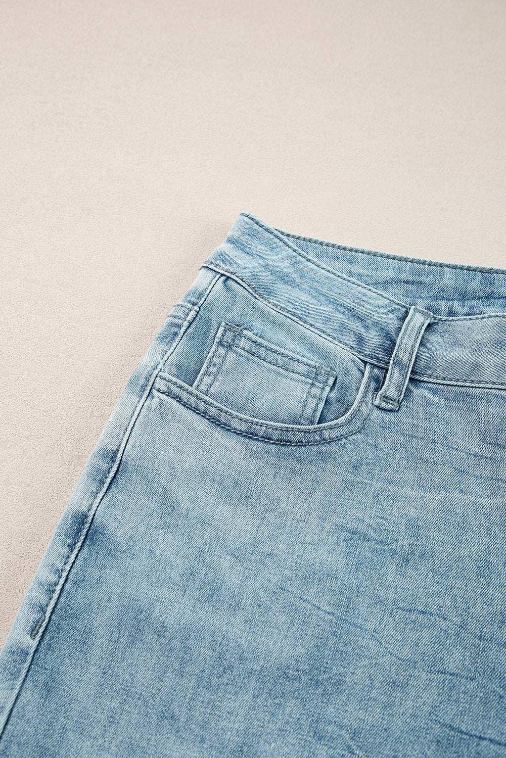 Dusk blue acid wash extra wide leg high waist long jeans by Mommas Hive, showing the relaxed fit and stylish denim details.