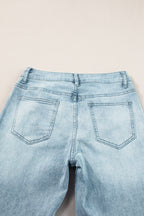 Dusk blue acid wash Mommas Hive extra wide leg high waist long jeans with cotton, polyester, and elastane fabric, relaxed fit.