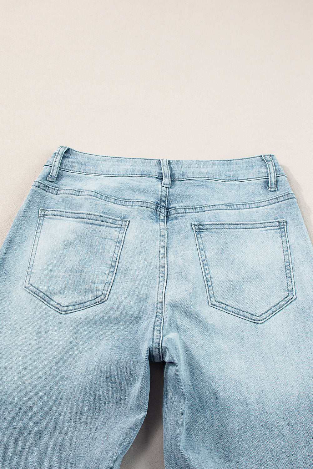 Dusk blue acid wash Mommas Hive extra wide leg high waist long jeans with cotton, polyester, and elastane fabric, relaxed fit.