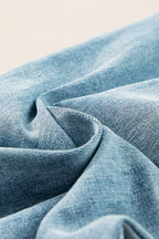 Dusk blue acid wash extra wide leg high waist long jeans by Mommas Hive, showing the relaxed fit and faded denim texture.