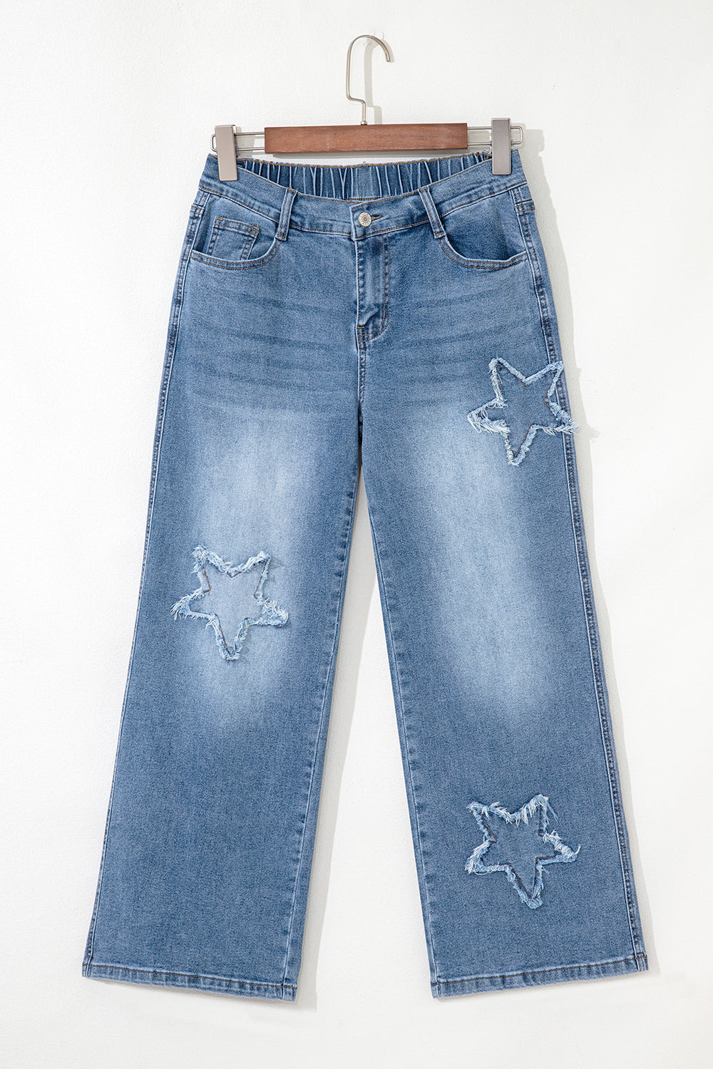 Stone blue Star Patchwork cropped wide-leg high-waist jeans by Mommas Hive, featuring patchwork design and relaxed fit.