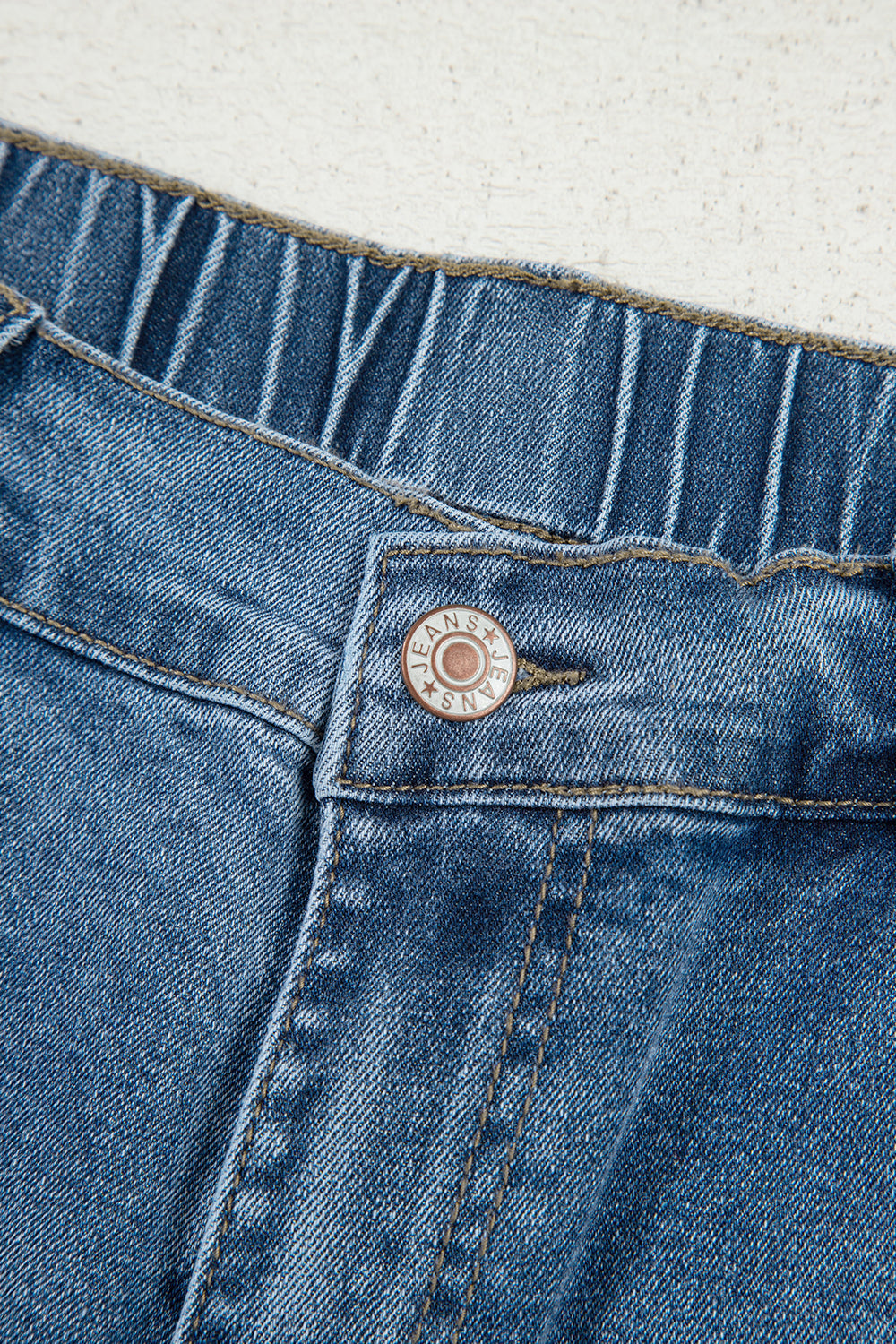 Stone blue star patchwork cropped wide-leg high-waist jeans from Mommas Hive, featuring a distressed finish and relaxed fit.