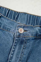 Stone blue star patchwork cropped wide-leg high-waist jeans from Mommas Hive, featuring a distressed finish and relaxed fit.