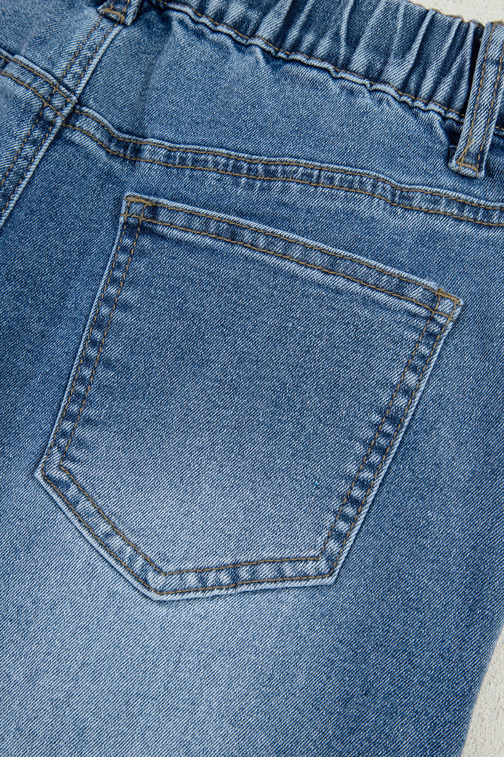 Stone blue star patchwork cropped wide-leg high-waist jeans by Mommas Hive, featuring a stylish patchwork design and comfortable fit.