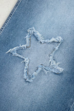 Stone blue star patchwork cropped wide-leg high-waist jeans by Mommas Hive, featuring distressed denim and a relaxed fit.