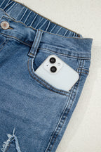 Stone blue star patchwork cropped wide-leg high-waist jeans by Mommas Hive, featuring a stylish patchwork design and comfortable fit.