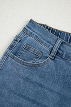 Stone blue star patchwork cropped wide-leg high-waist jeans by Mommas Hive, featuring distressed details and a relaxed fit.