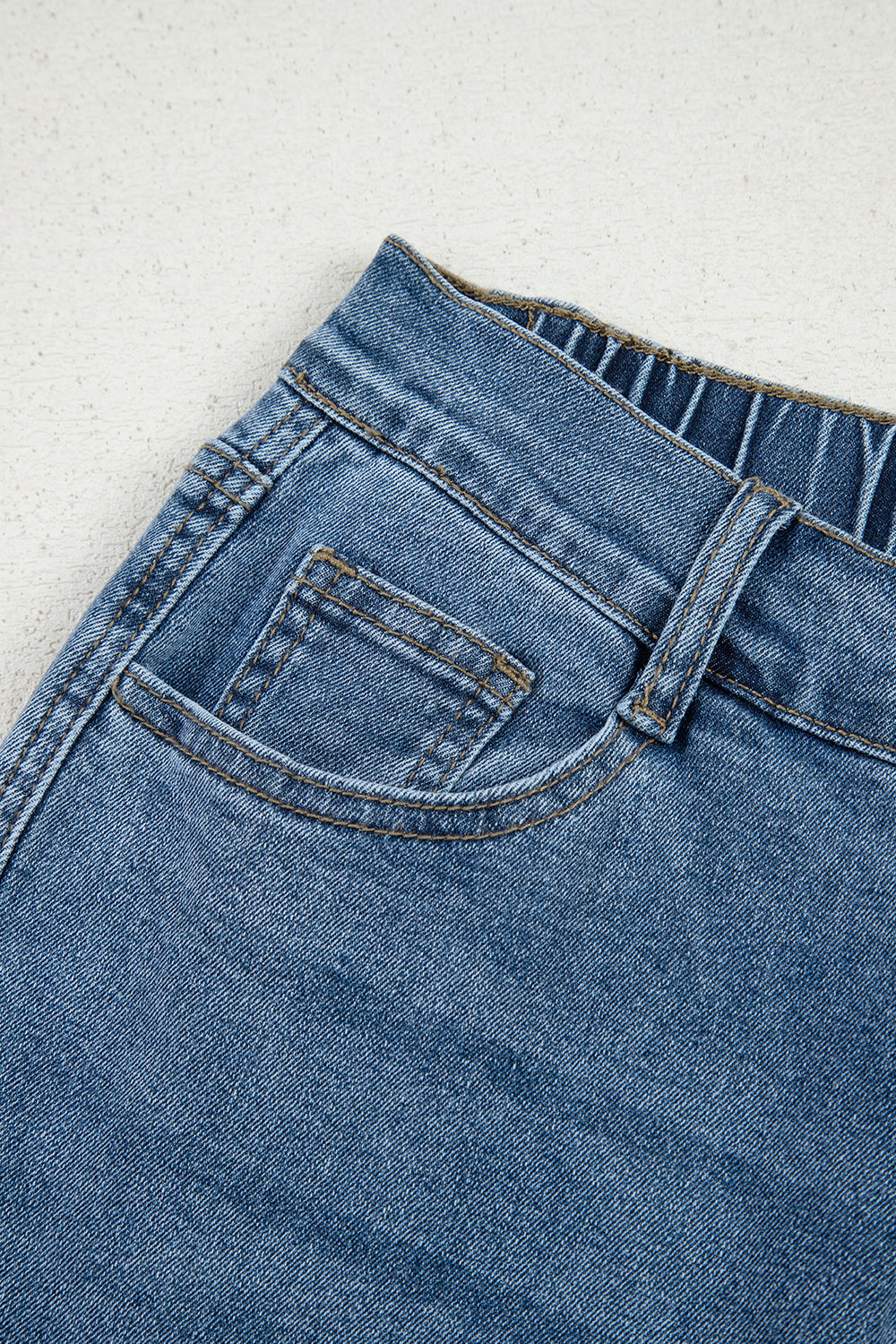 Stone blue star patchwork cropped wide-leg high-waist jeans by Mommas Hive, featuring distressed details and a relaxed fit.