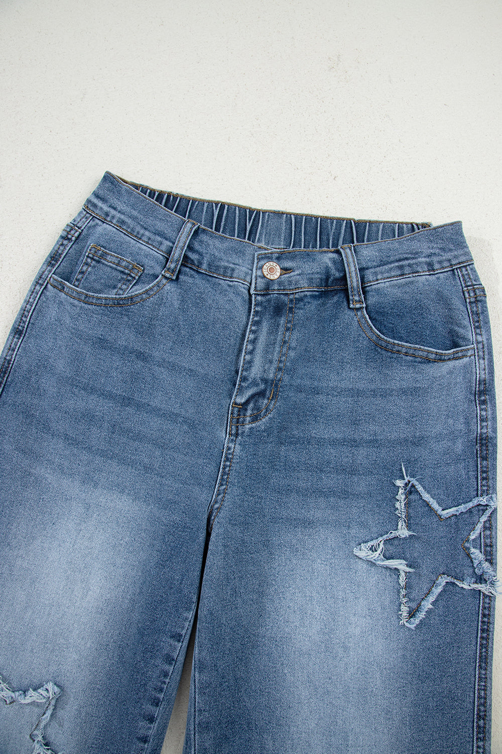 Stone blue star patchwork cropped wide-leg high-waist jeans from Mommas Hive, featuring a comfortable fit and stylish design.