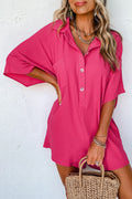 Bright pink Mommas Hive loose romper with half-button collar, made of 100% polyester, featuring a relaxed fit and stylish design.