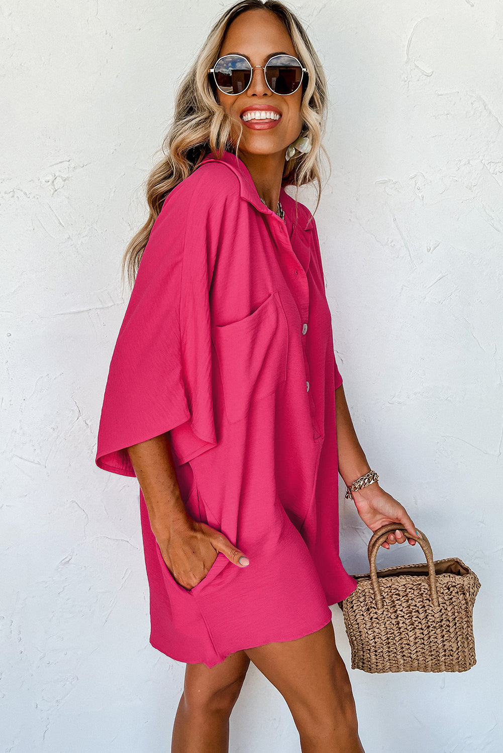 Bright pink Mommas Hive loose romper with half-button collar, made of 100% polyester, perfect for casual wear.