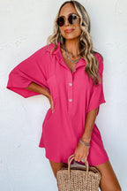 Bright pink Mommas Hive loose romper with half-button collar, made of 100% polyester, featuring a relaxed, casual fit.