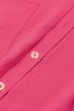 Bright pink Mommas Hive loose romper with half-button collar, made of 100% polyester, featuring a relaxed fit and casual style.