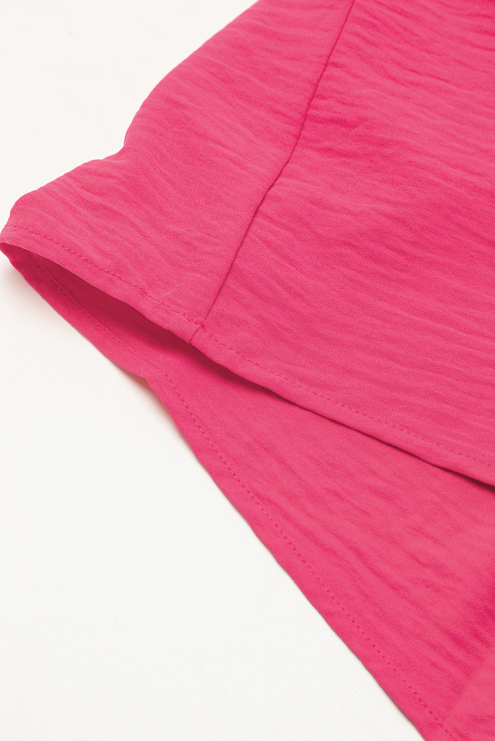 Bright pink Mommas Hive loose romper with half-button collar, made of lightweight polyester, perfect for casual wear.