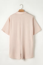 Bright pink Mommas Hive half-button collared loose romper, made of polyester, featuring a relaxed fit and casual style.