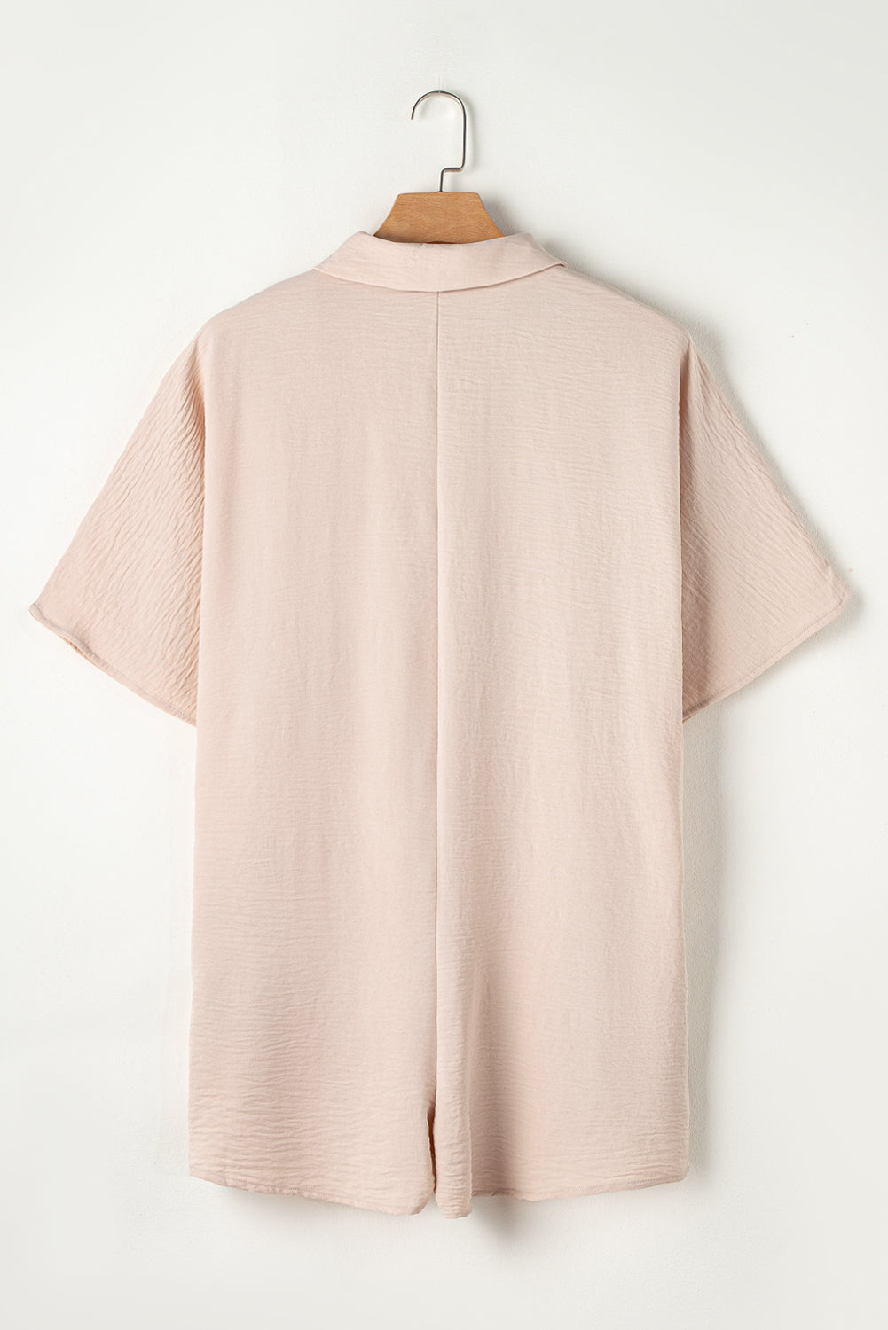 Bright pink Mommas Hive half-button collared loose romper, made of polyester, featuring a relaxed fit and casual style.