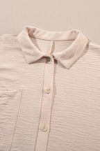 Bright pink Mommas Hive half-button collared loose romper, made of 100% polyester, featuring a relaxed fit and casual style.