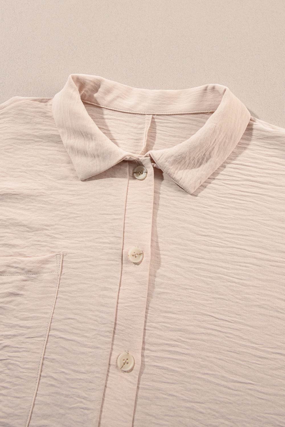 Bright pink Mommas Hive half-button collared loose romper, made of 100% polyester, featuring a relaxed fit and casual style.
