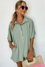 Bright pink Mommas Hive loose romper with half-button collar, made of 100% polyester, featuring a relaxed fit and casual style.