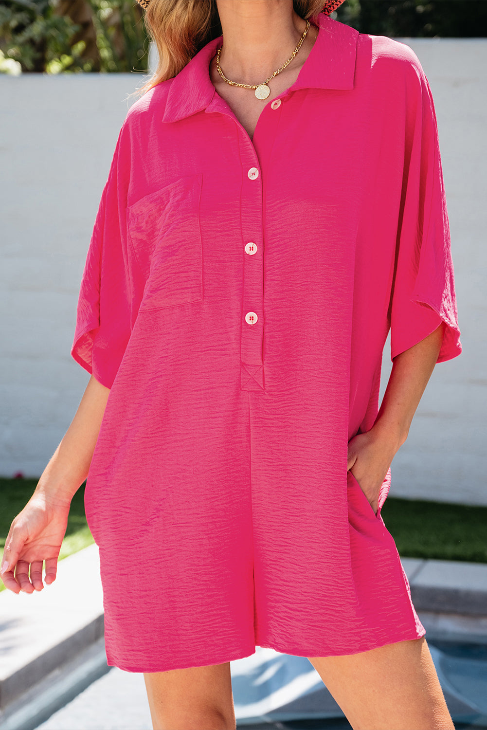 Bright pink Mommas Hive half-button collared loose romper, made of 100% polyester, stylish jumpsuit with relaxed fit.