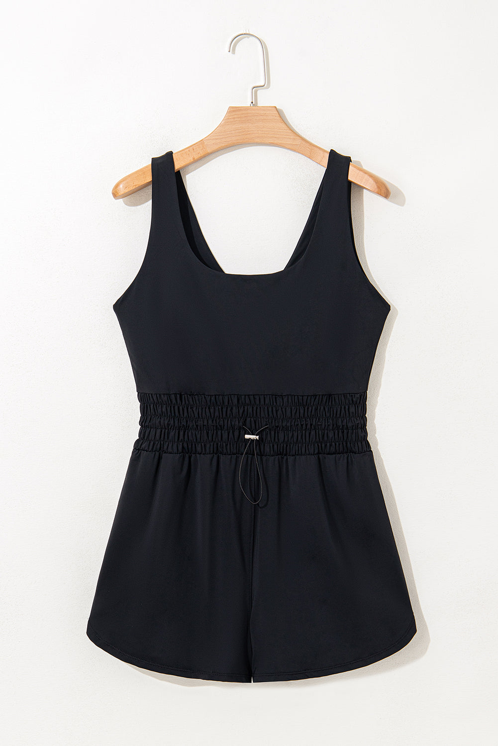 Plain sleeveless romper by Mommas Hive with a cinched waist, drawstring detail, made from polyamide and elastane fabric.