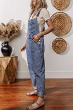 Mommas Hive Sail Blue Denim Bib Jumpsuit with straight legs and pockets, made of 85% cotton and 15% polyester.