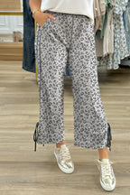 Gray leopard high waist culotte pants with side bow, straight-leg design, made by Mommas Hive, featuring polyester and elastane fabric.
