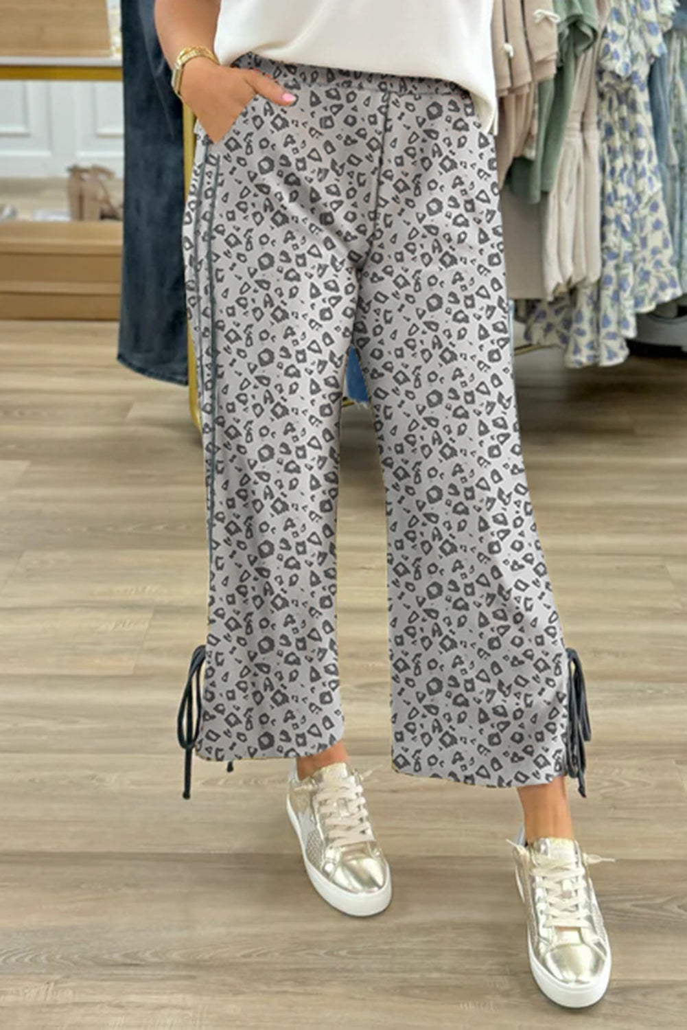 Gray leopard high waist culotte pants with side bow, straight-leg design, made by Mommas Hive, featuring polyester and elastane fabric.
