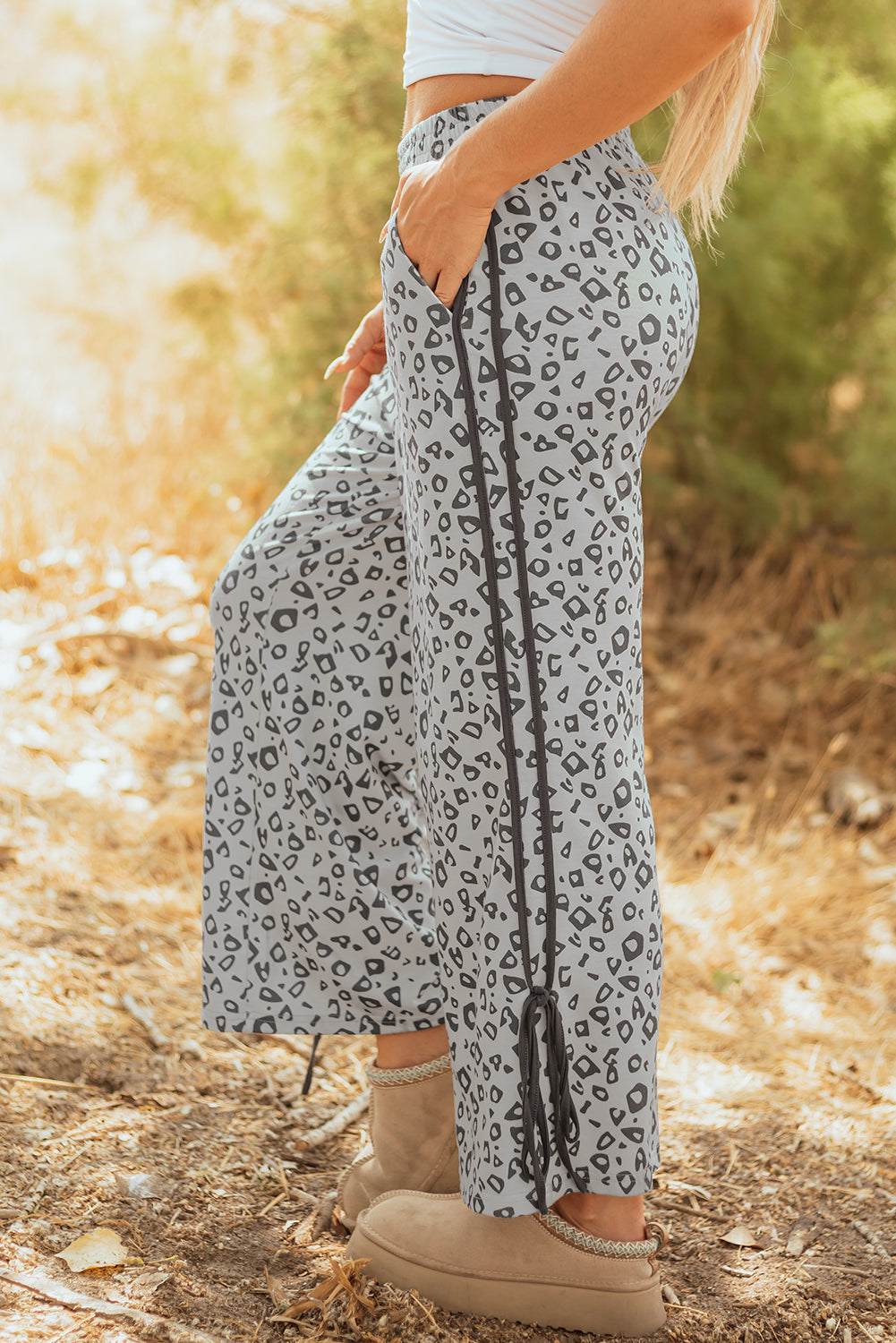 Gray leopard high waist culotte pants from Mommas Hive, featuring side bow detail and straight leg design, made of polyester and elastane.