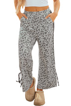 Gray leopard print high waist culotte pants with side bow and straight-leg fit from Mommas Hive, made of polyester and elastane.