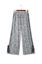 Gray leopard print high waist culottes with side bow, straight leg design from Mommas Hive, made of polyester and elastane.
