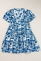 Blue floral loose dress with ricrac trim, split neck, and short sleeves from Mommas Hive, made of lightweight polyester fabric.