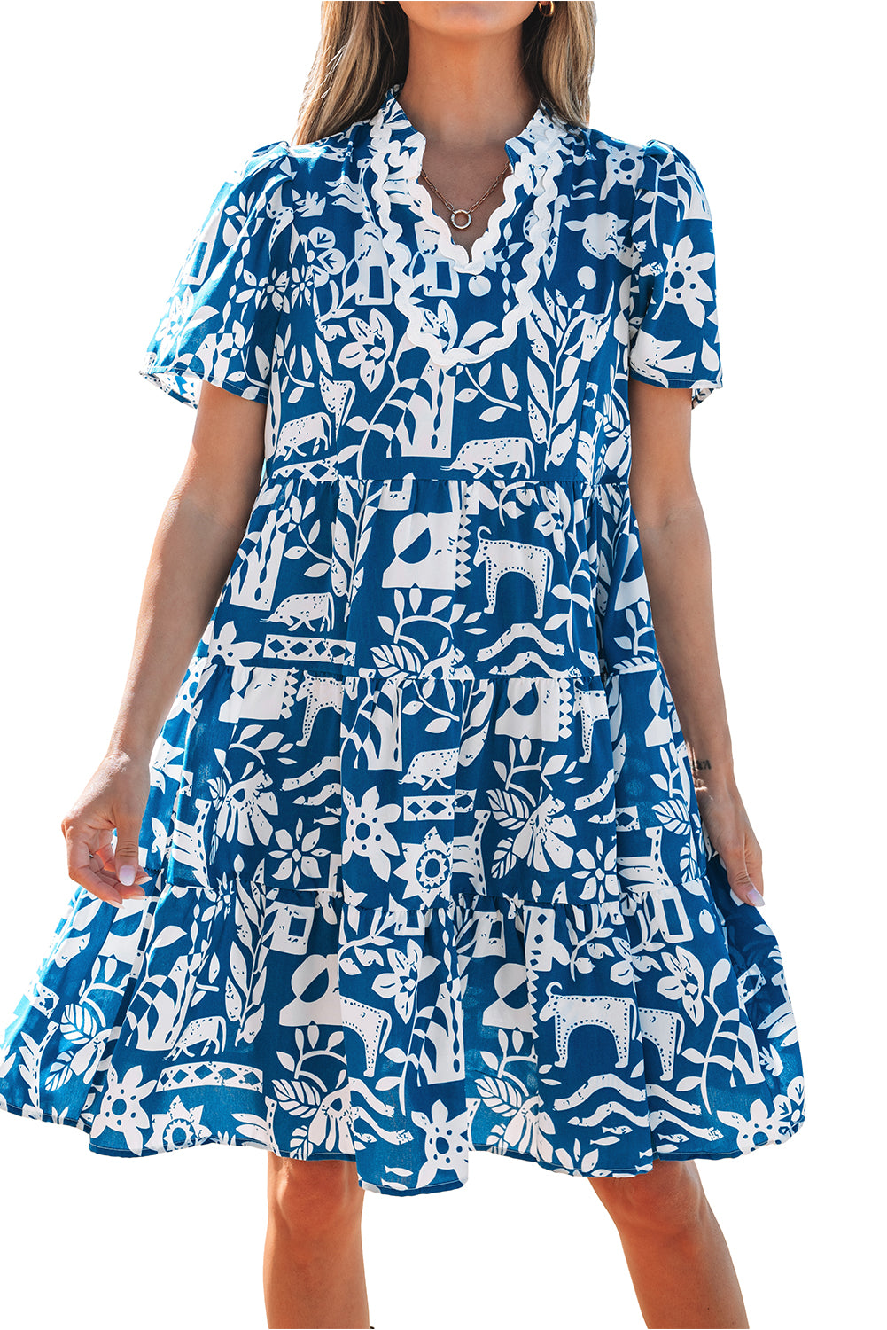 Blue floral loose dress with split neckline and ricrac trim from Mommas Hive, made of lightweight polyester fabric.