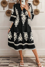 Black Western geometric print midi dress by Mommas Hive with 3/4 sleeves and a loose fit, made of 100% polyester.