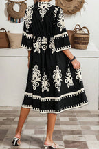 Black Western geometric print midi dress by Mommas Hive with 3/4 sleeves, loose fit, and casual style.