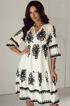 Black Western geometric print midi dress by Mommas Hive with 3/4 sleeves and a loose, comfortable fit.