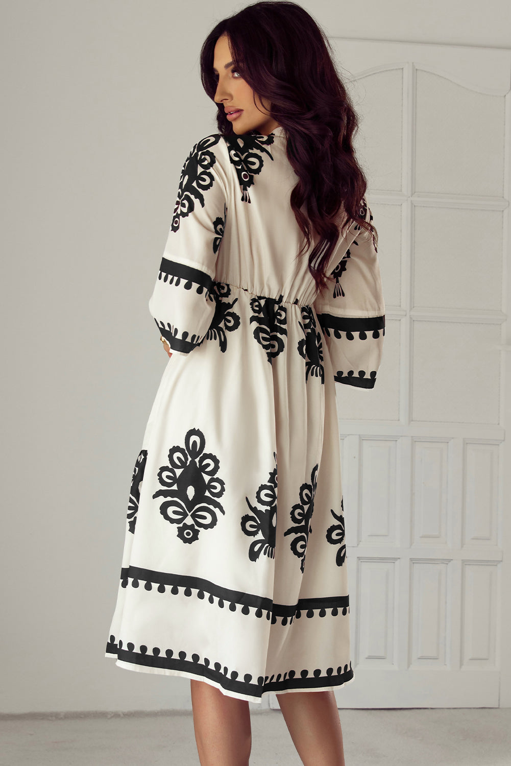 Black Western geometric print midi dress by Mommas Hive with 3/4 sleeves, loose fit, perfect for casual or southwestern-inspired style.