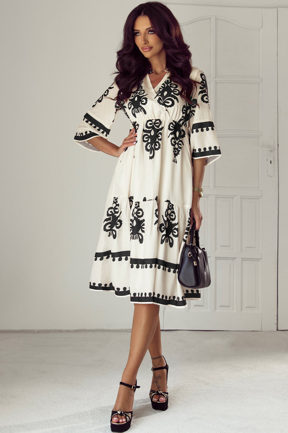 Black Western geometric print midi dress from Mommas Hive with 3/4 sleeves, loose fit, and stylish design.
