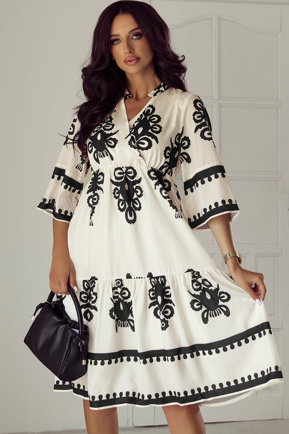 Black Western geometric print midi dress by Mommas Hive with 3/4 sleeves, loose fit, and stylish design.