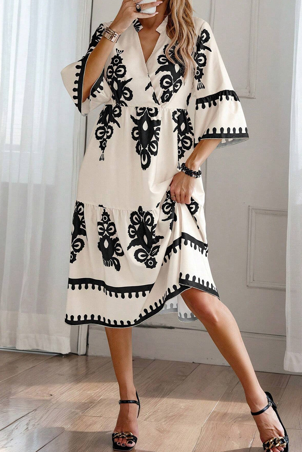 Black Western geometric print midi dress by Mommas Hive with 3/4 sleeves and a loose fit, perfect for casual or stylish wear.