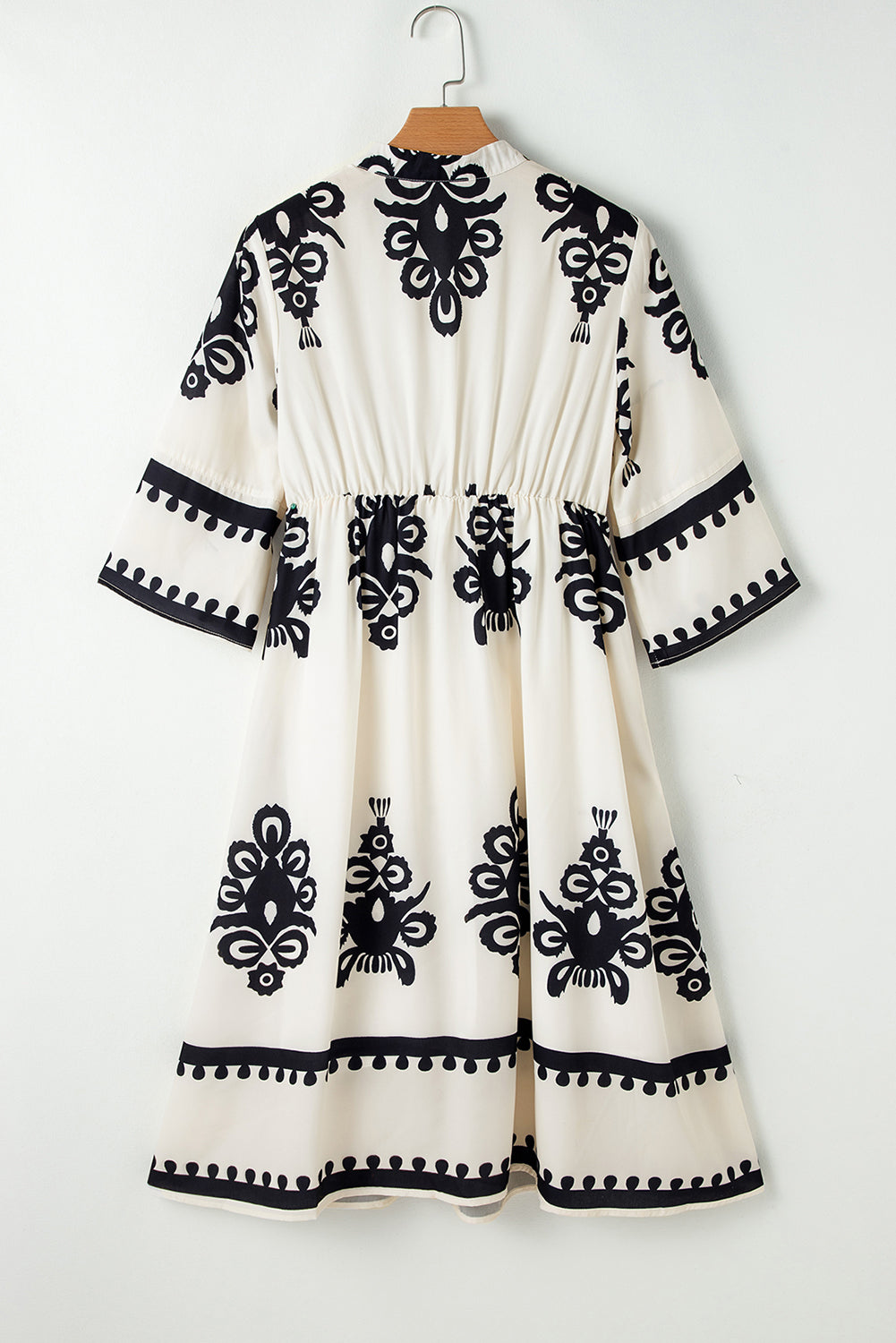 Black Western geometric print midi dress with 3/4 sleeves, loose fit, made of polyester, by Mommas Hive.