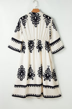 Black Western geometric print midi dress with 3/4 sleeves, loose fit, made of polyester, by Mommas Hive.
