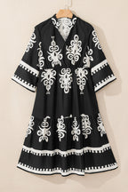 Black Western geometric print midi dress by Mommas Hive featuring 3/4 sleeves and a loose, comfortable fit.