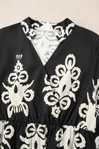 Black Western geometric print midi dress by Mommas Hive with 3/4 sleeves and a loose, comfortable fit.