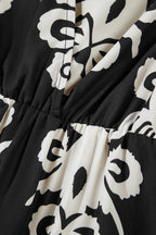 Black Western geometric print midi dress by Mommas Hive with 3/4 sleeves and a loose fit, made from lightweight polyester fabric.
