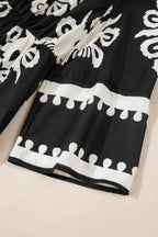 Black Western geometric print midi dress by Mommas Hive with 3/4 sleeves and a loose fit, perfect for casual or stylish wear.