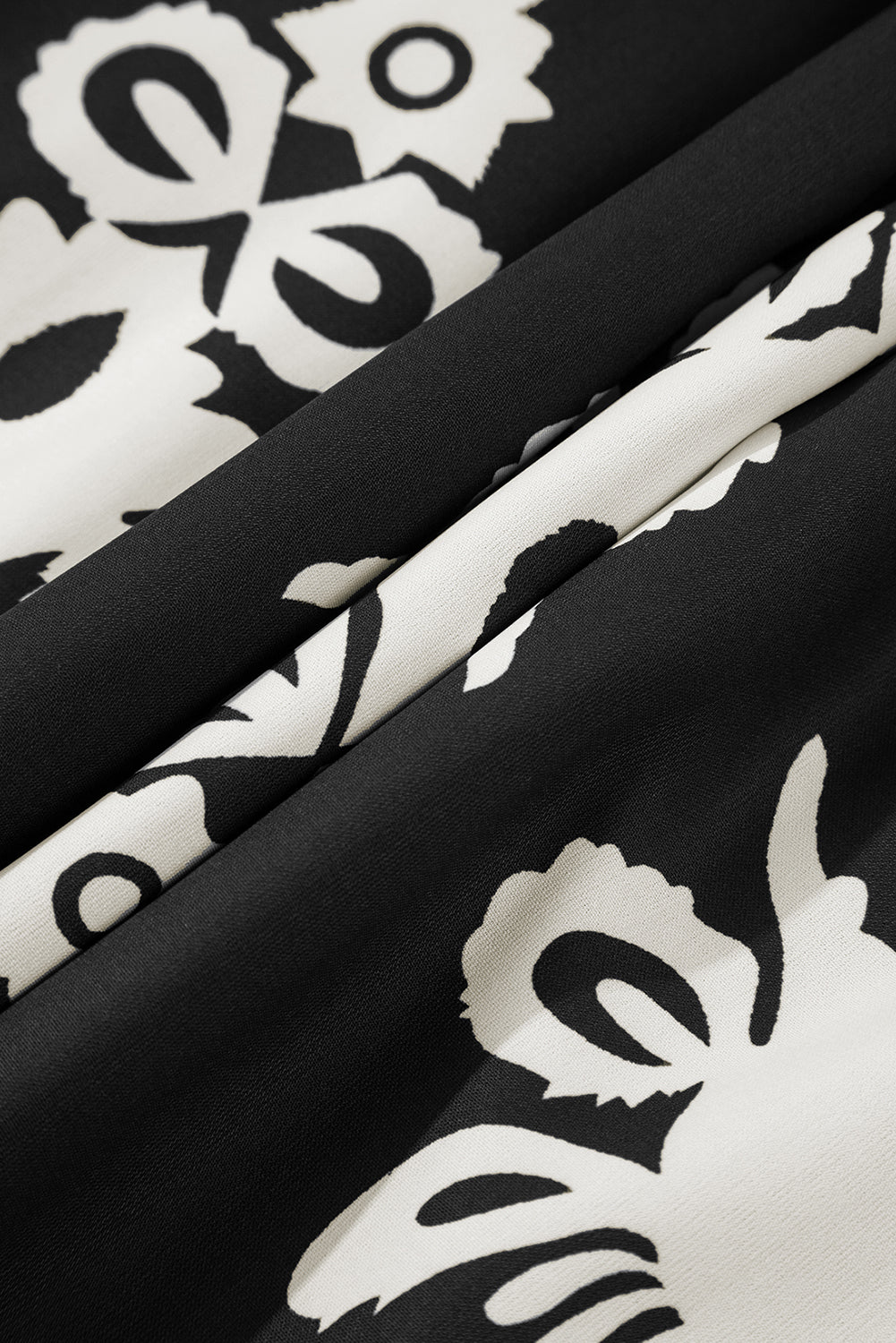 Black Western geometric print midi dress by Mommas Hive with 3/4 sleeves and a loose, flowy fit.
